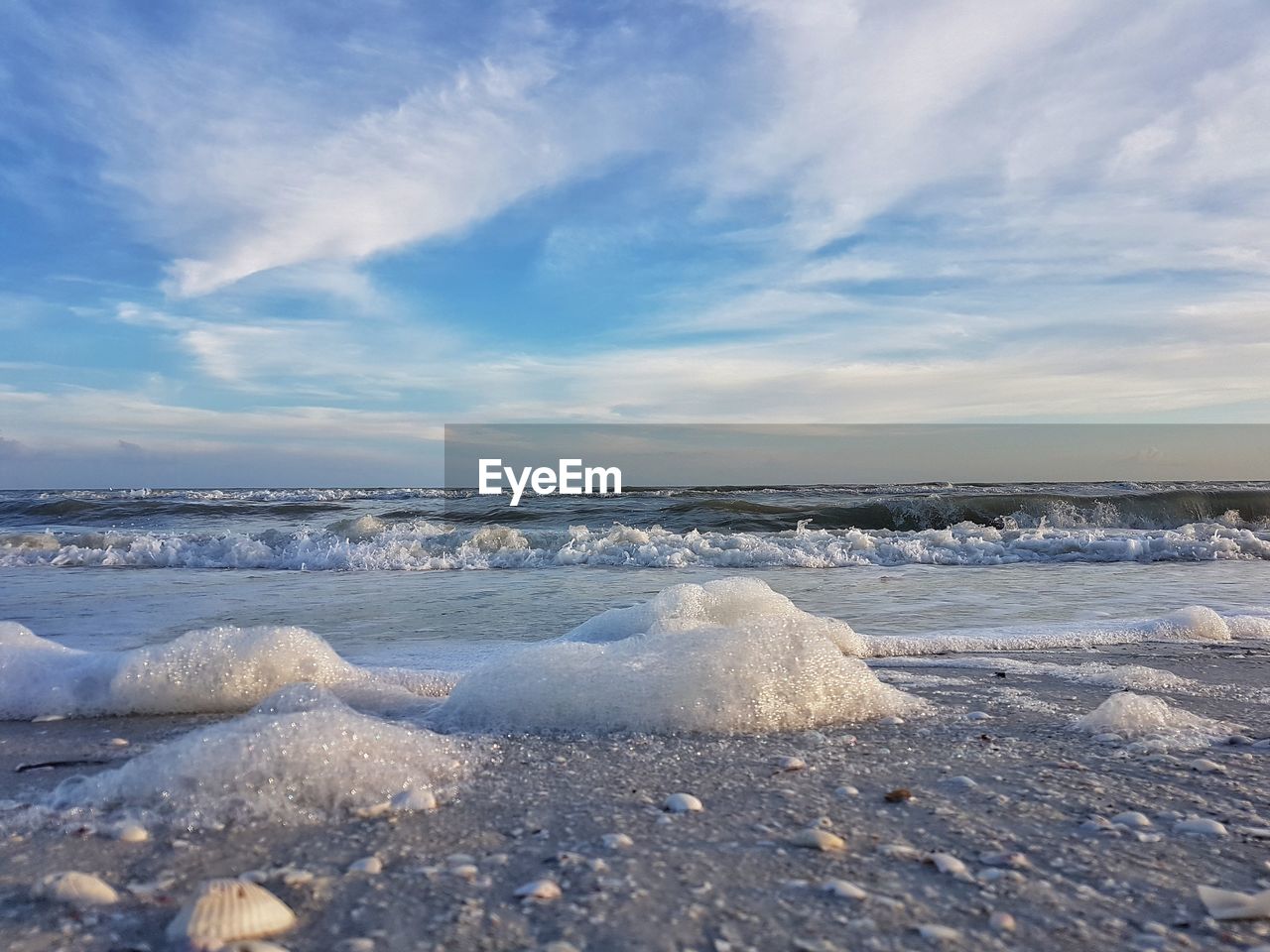 Scenic view of sea against sky during winter