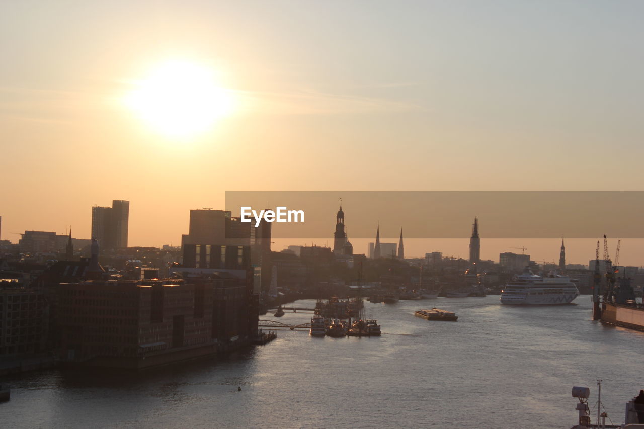 High angle view of river against buildings