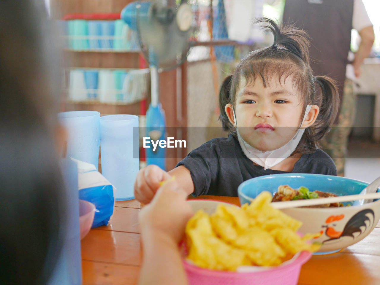 Portrait of boy eating food