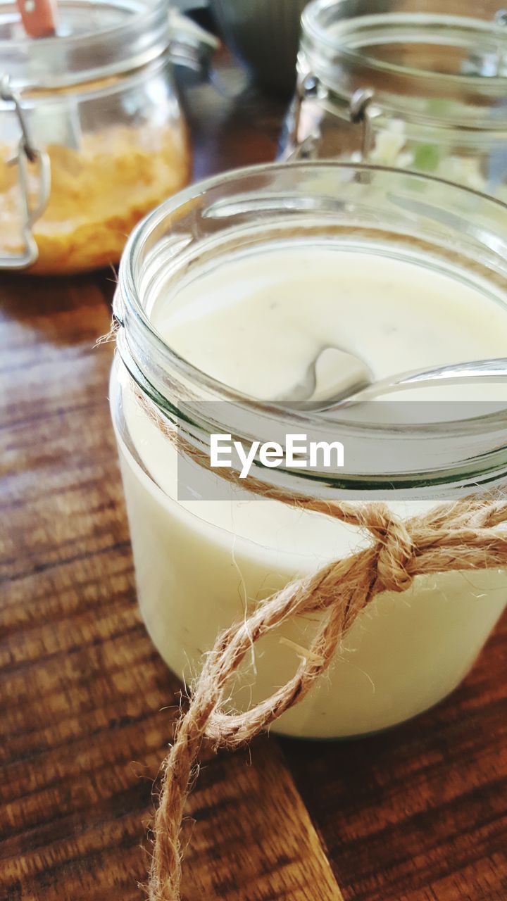 CLOSE-UP OF DRINK IN JAR