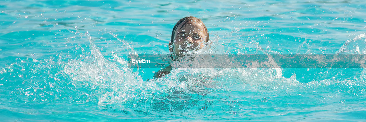 high angle view of swimming in water