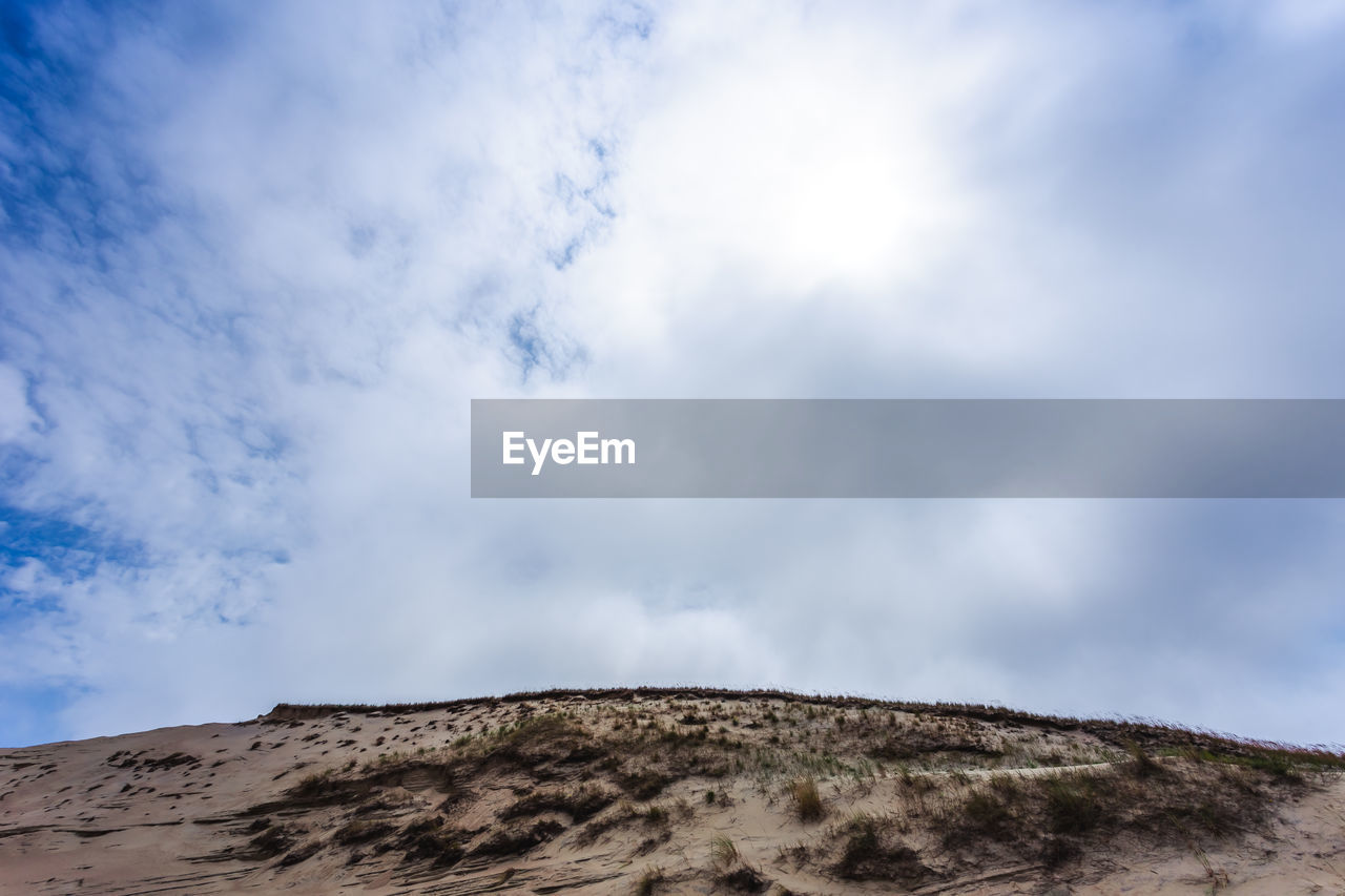 Low angle view of mountain against sky