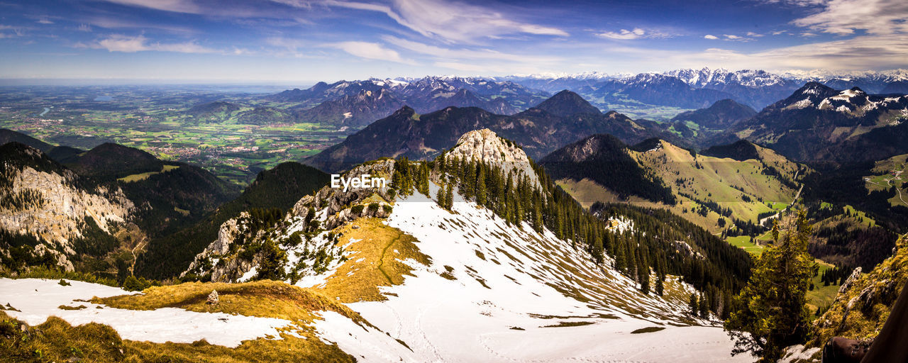 Scenic view of mountains against sky during winter