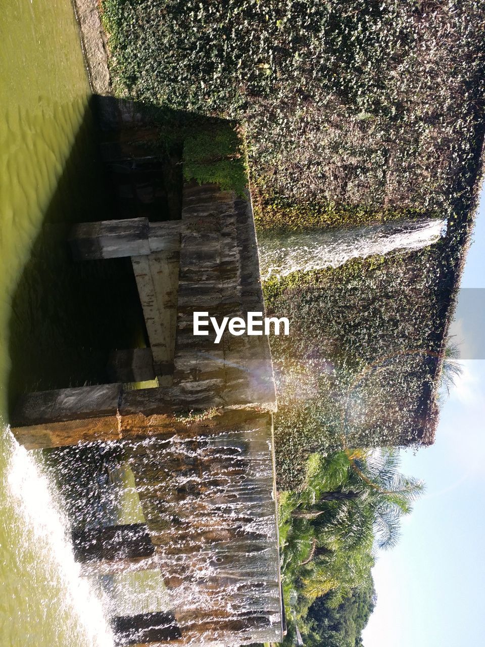 water, motion, flowing water, waterfall, architecture, long exposure, built structure, day, splashing, outdoors, nature, no people, beauty in nature, watermill