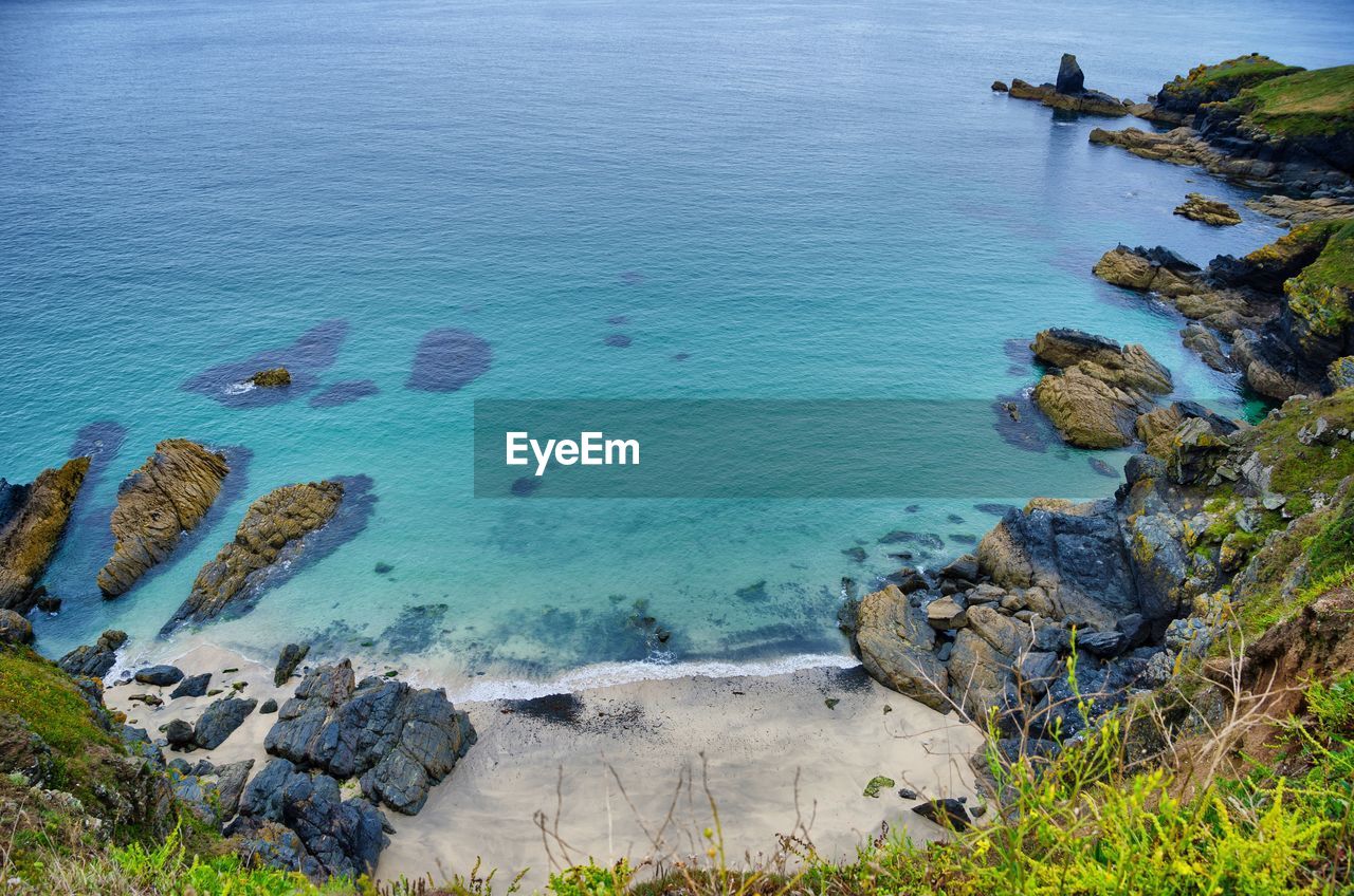 High angle view of beach against blue sky