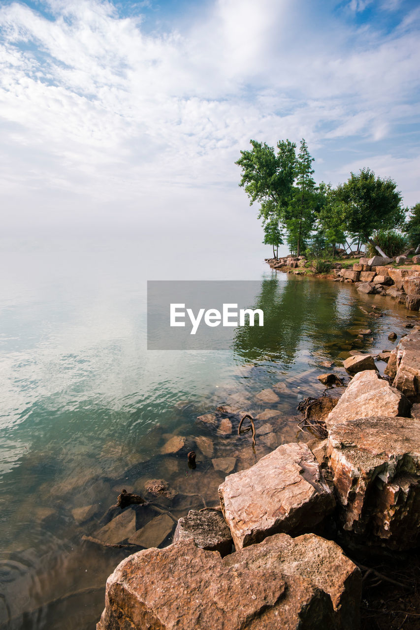 VIEW OF SEA AGAINST CLOUDY SKY