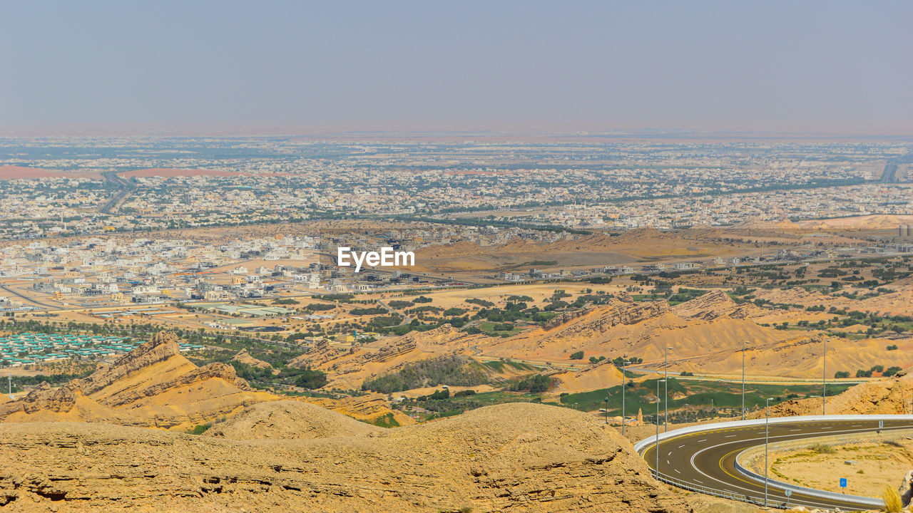 HIGH ANGLE VIEW OF ROAD ALONG LANDSCAPE