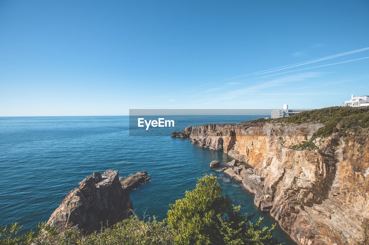 scenic view of sea against clear blue sky