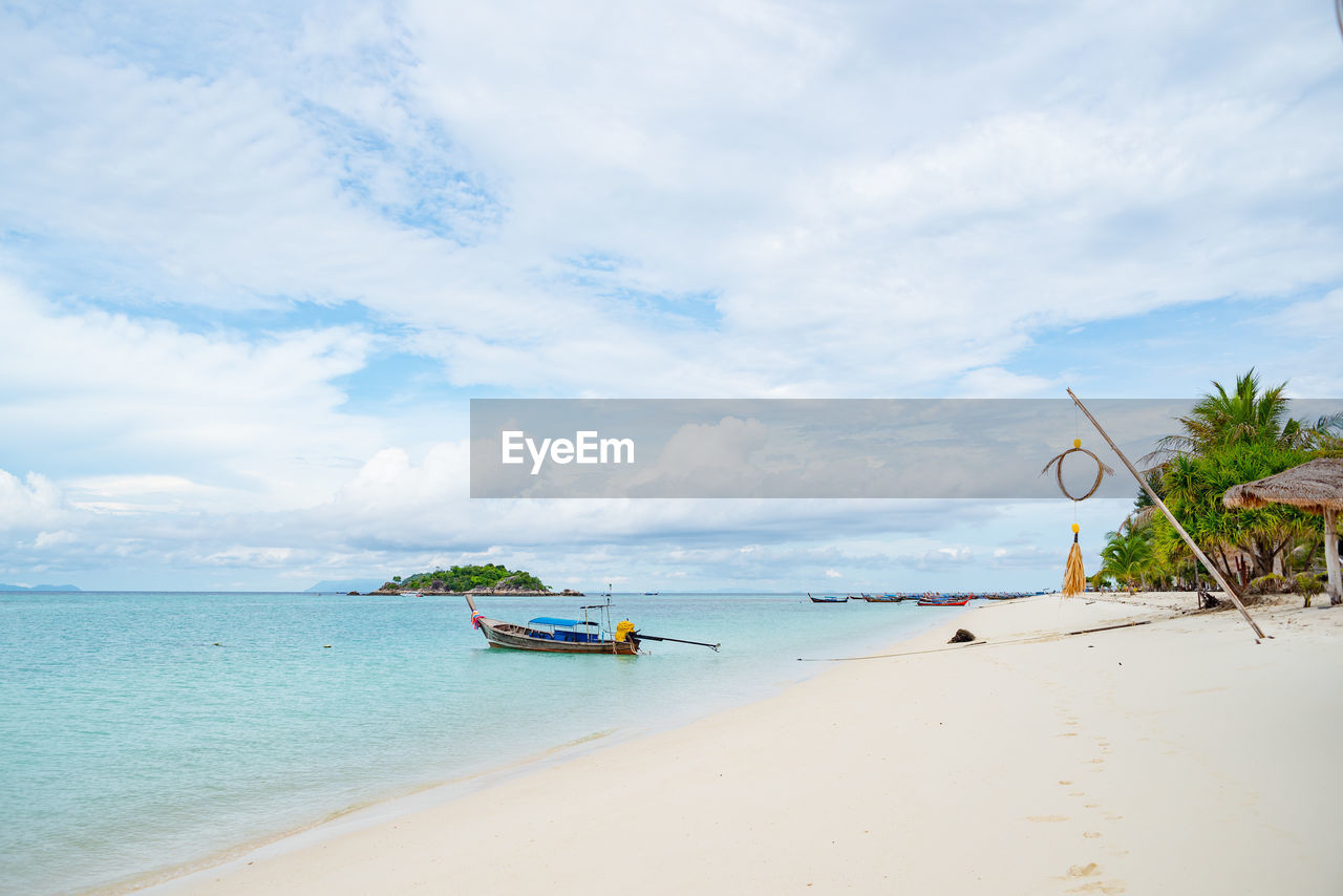 Scenic view of sea against sky at sunset beach, lipe island, thailand