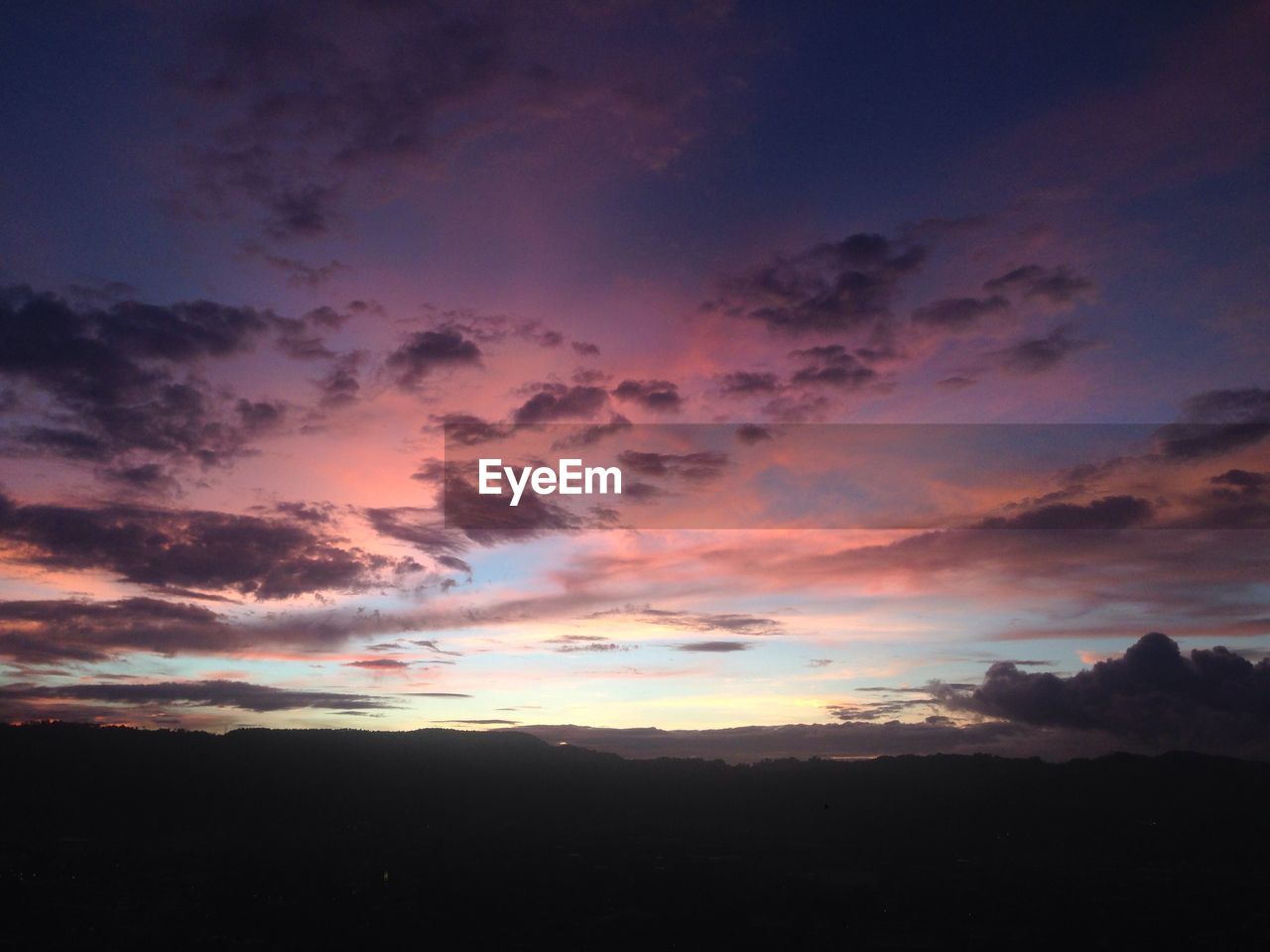 SILHOUETTE LANDSCAPE AGAINST SKY AT SUNSET