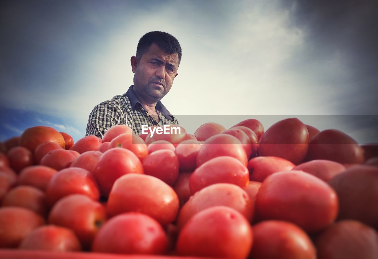 FULL LENGTH OF MAN WITH FRUITS