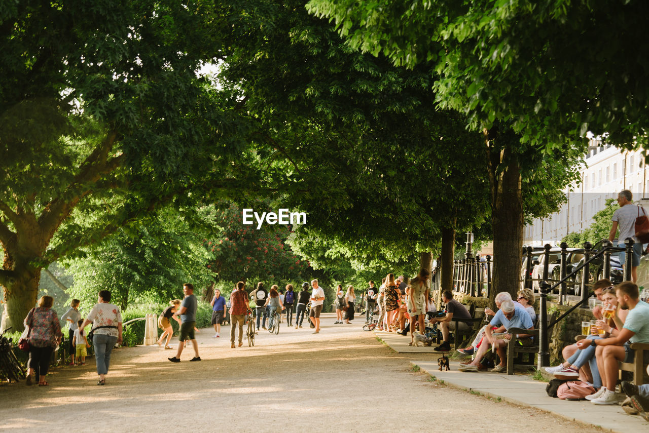 PEOPLE ON STREET IN CITY
