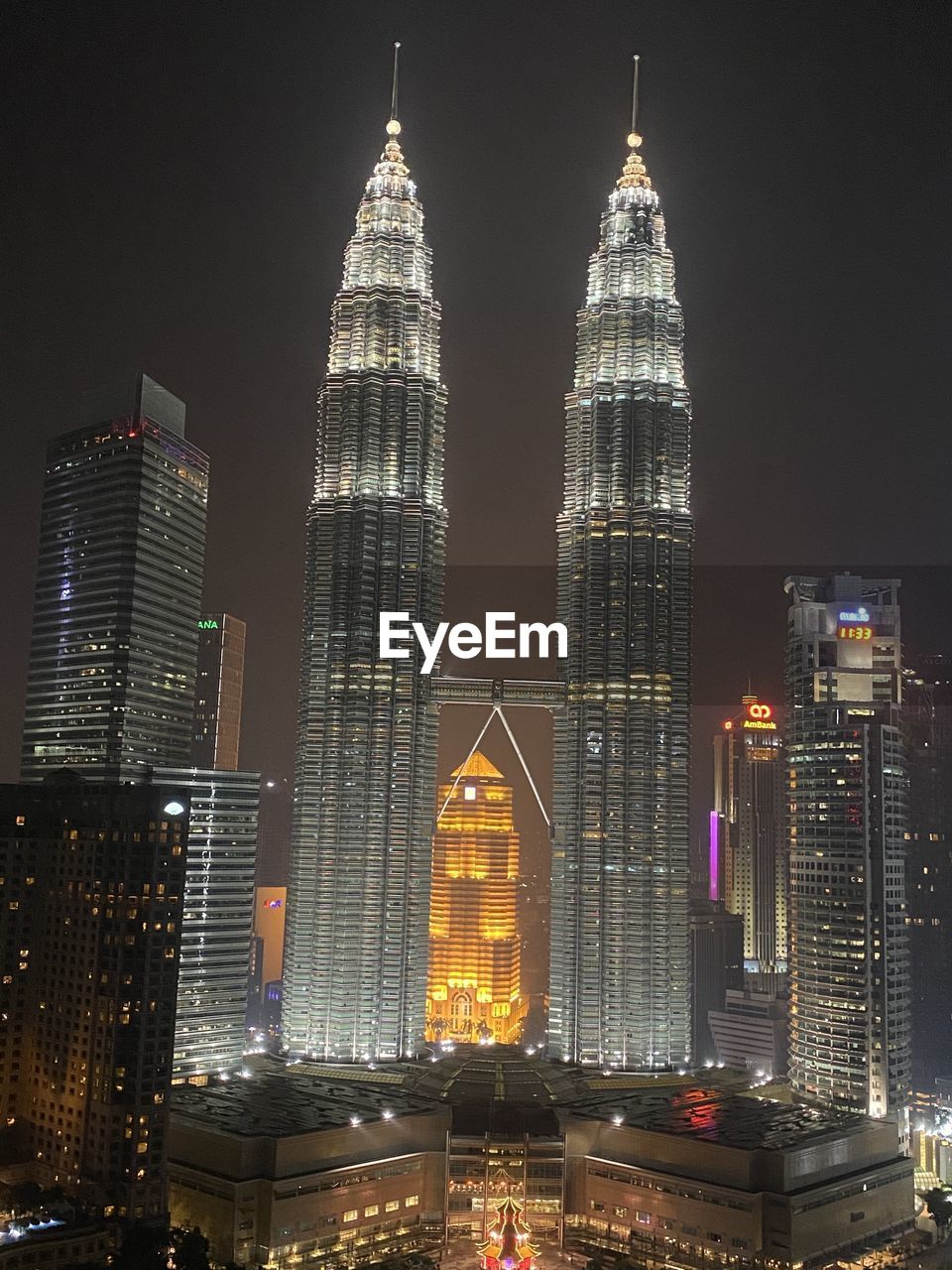 Illuminated buildings in city at night