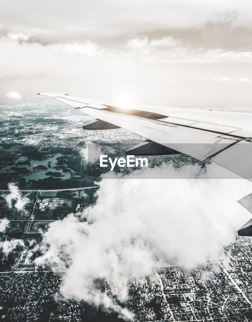 AERIAL VIEW OF SNOW COVERED LANDSCAPE