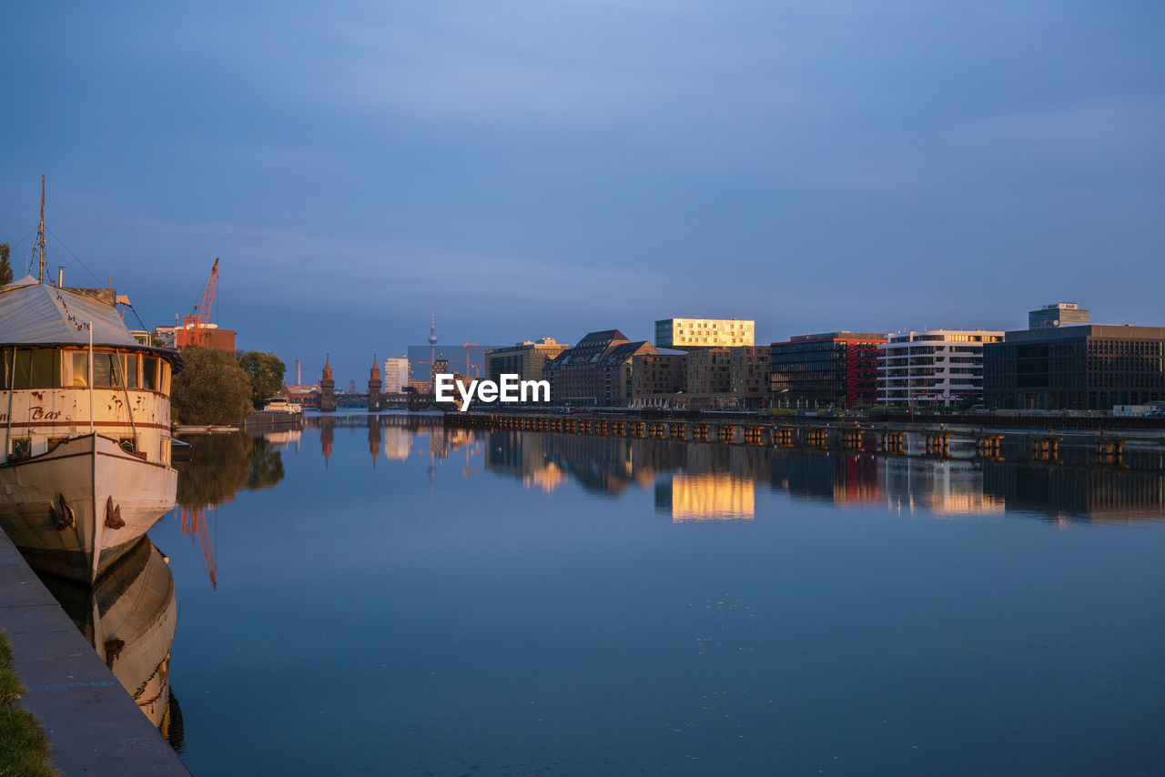 Spree river near osthafen early morning with reflection