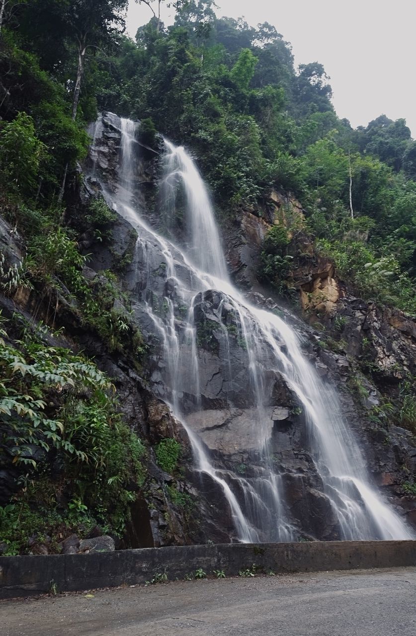 waterfall, water, scenics - nature, beauty in nature, tree, plant, motion, nature, environment, land, long exposure, body of water, forest, rock, no people, water feature, travel destinations, travel, tourism, outdoors, non-urban scene, flowing water, blurred motion, landscape, cliff, rock formation, power in nature, day, holiday, mountain, trip, vacation, splashing