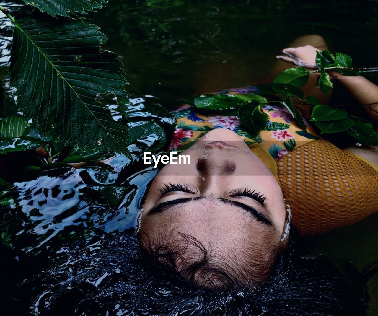 Close-up portrait of young woman sleeping