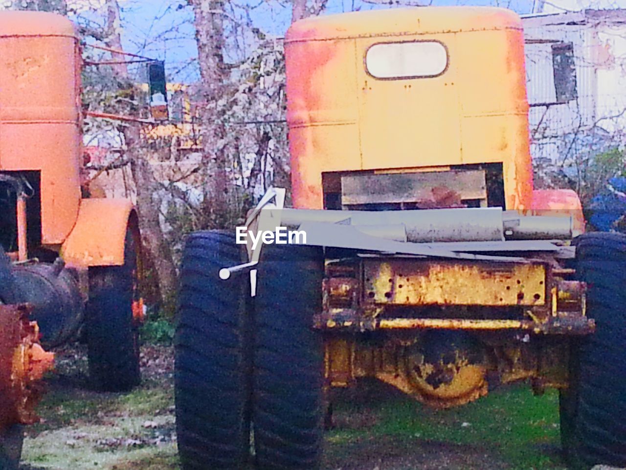 Vehicles parked on field