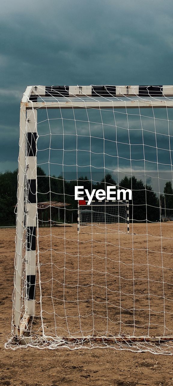 VIEW OF SOCCER FIELD AGAINST SKY