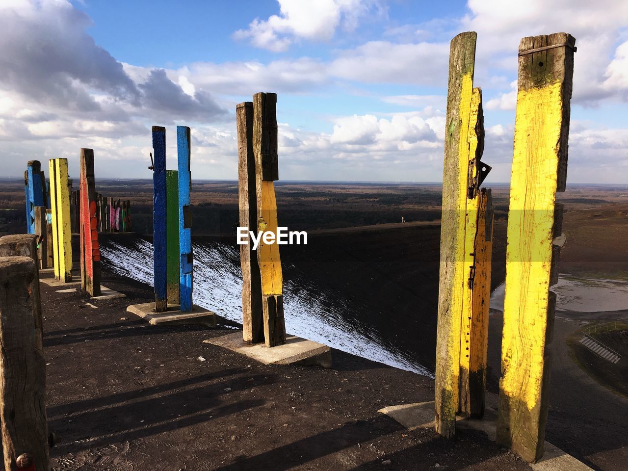 WOODEN POSTS ON SEA