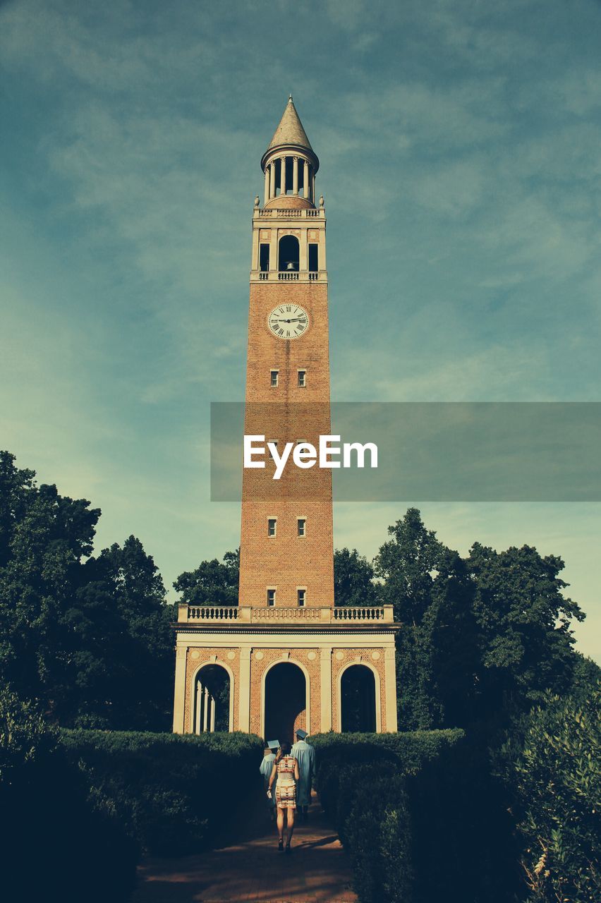 Low angle view of clock tower against the sky