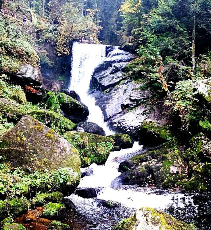 STREAM FLOWING THROUGH ROCKS