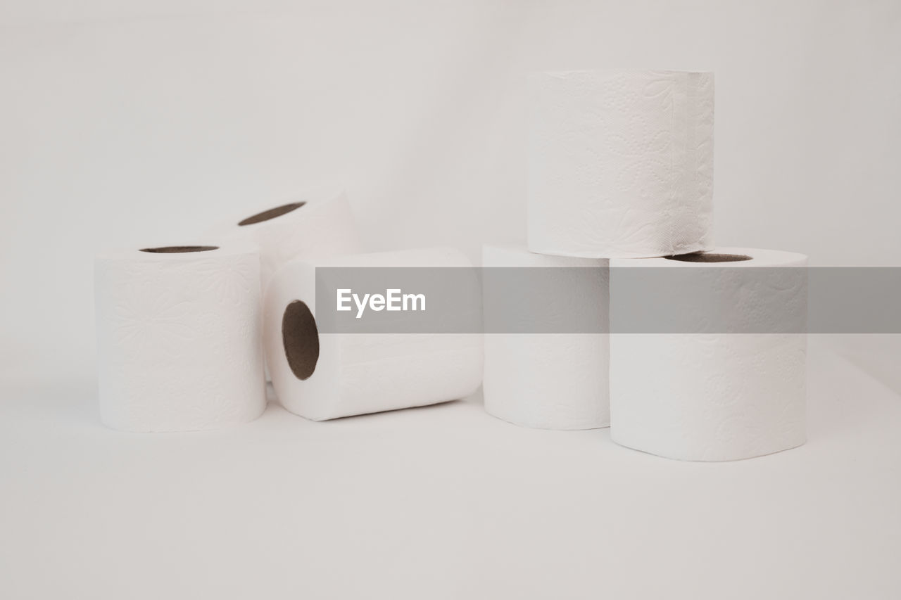 toilet paper, paper towel, paper, cylinder, rolled up, indoors, white, no people, hygiene, studio shot, ceramic, white background, simplicity