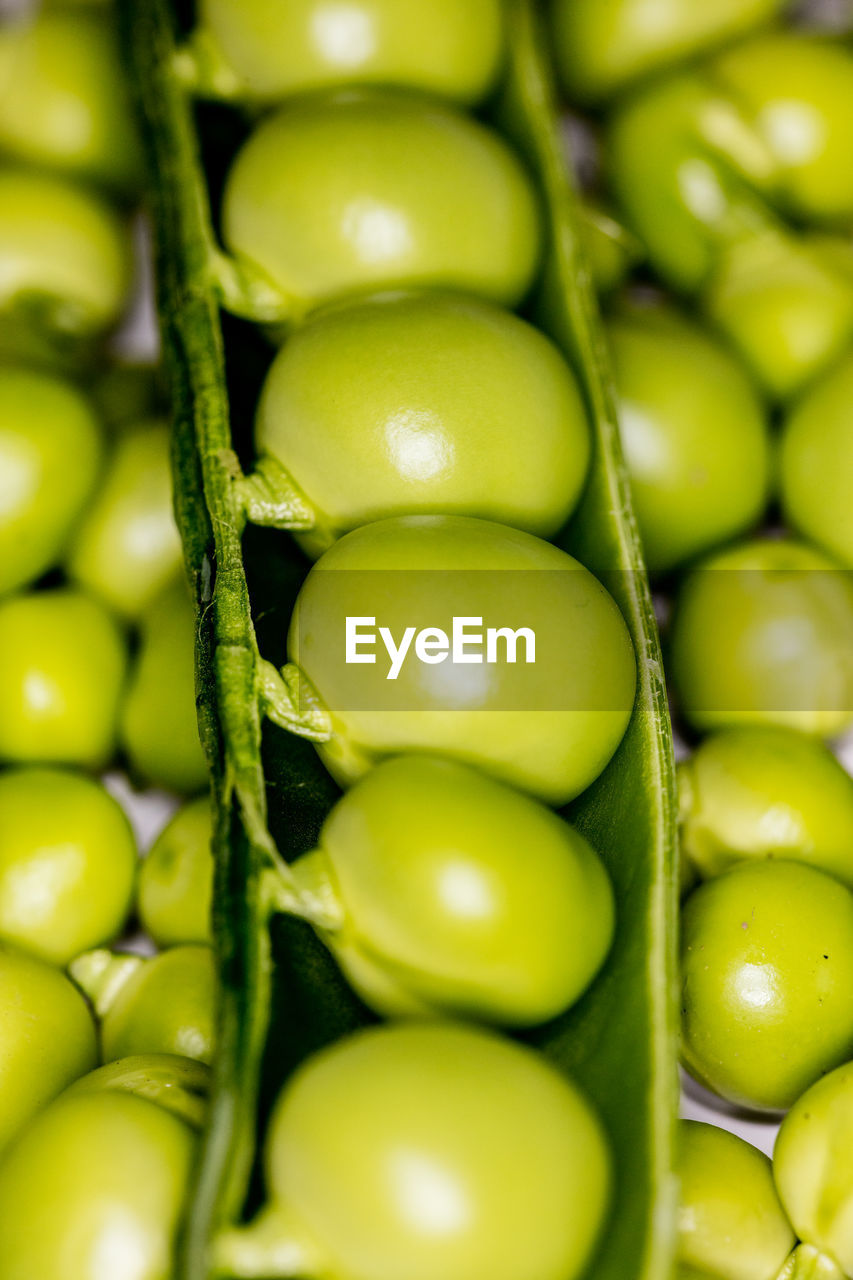 Macro view of peas in pea pod