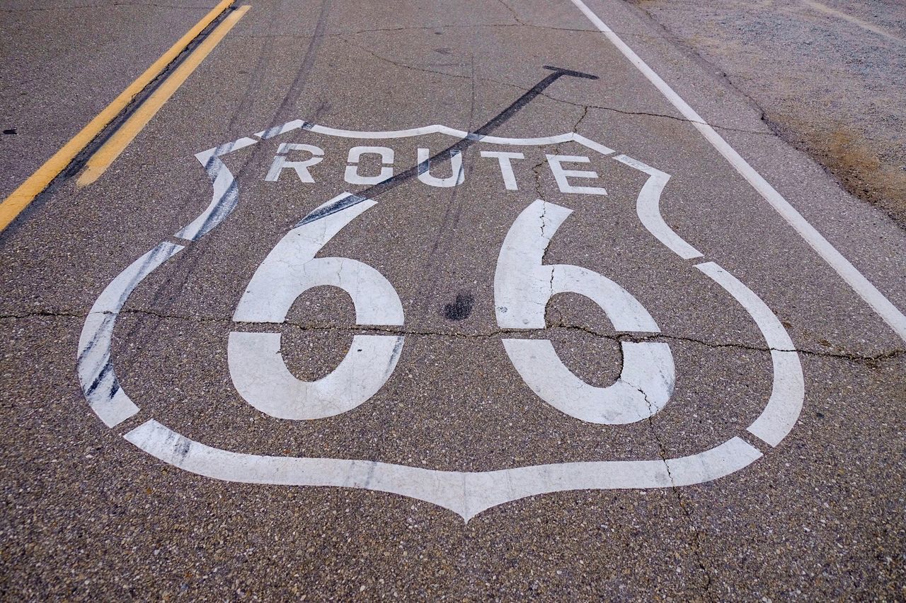 High angle view of sign on street