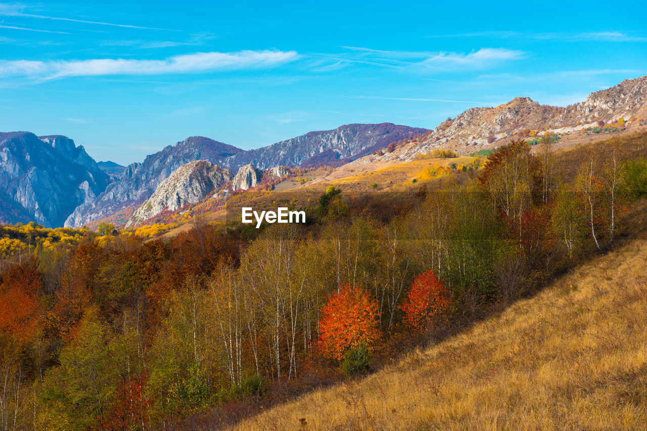 Scenic view of mountains against sky during autumn