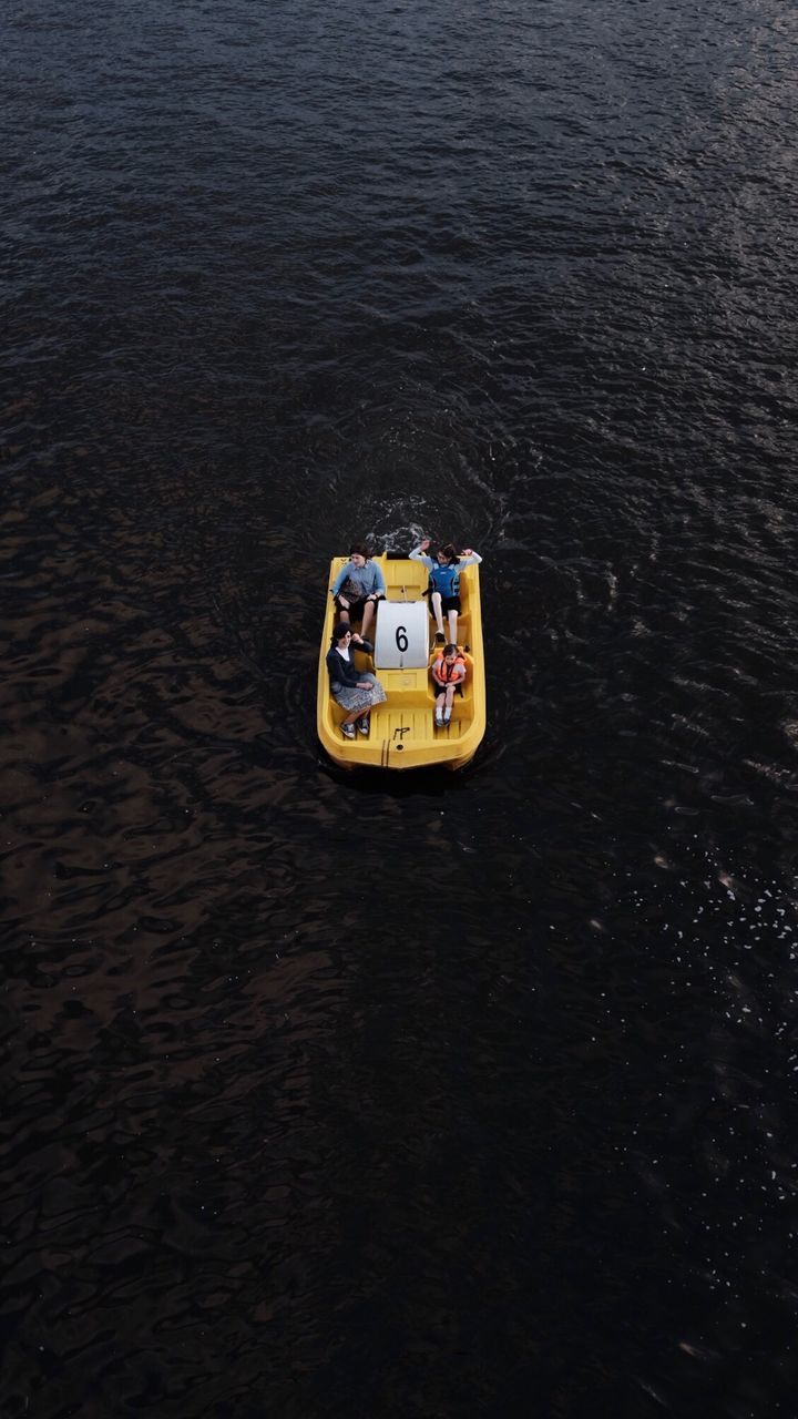 HIGH ANGLE VIEW OF MEN IN WATER