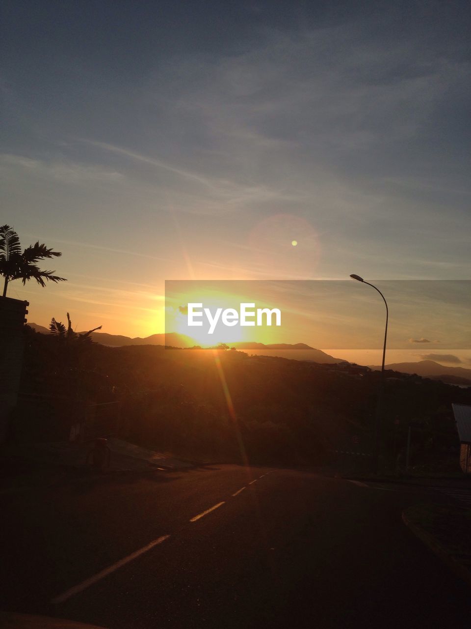 VIEW OF ROAD AT SUNSET