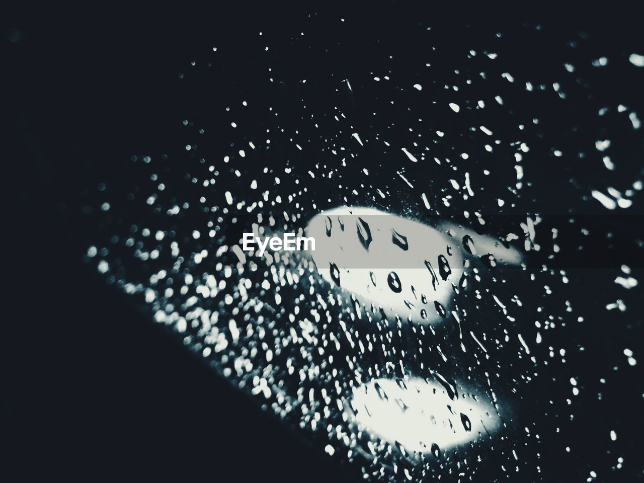 Close-up of water drops on glass