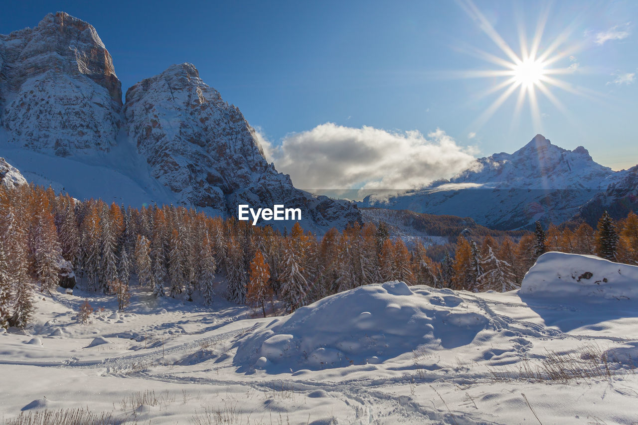 Awesome mount pelmo and mount civetta northern side winter panorama in a sunny day, dolomites, italy