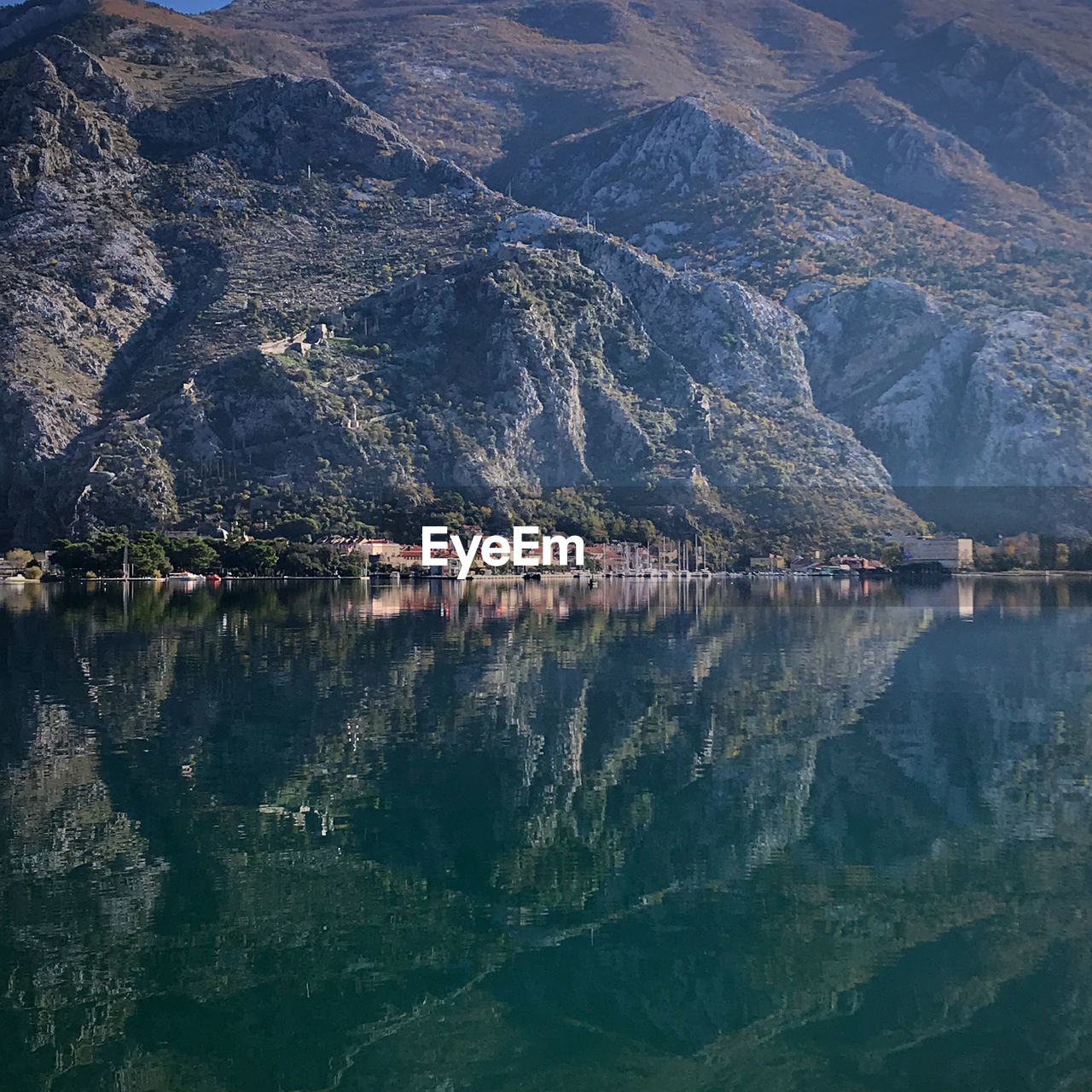 Scenic view of lake by mountain