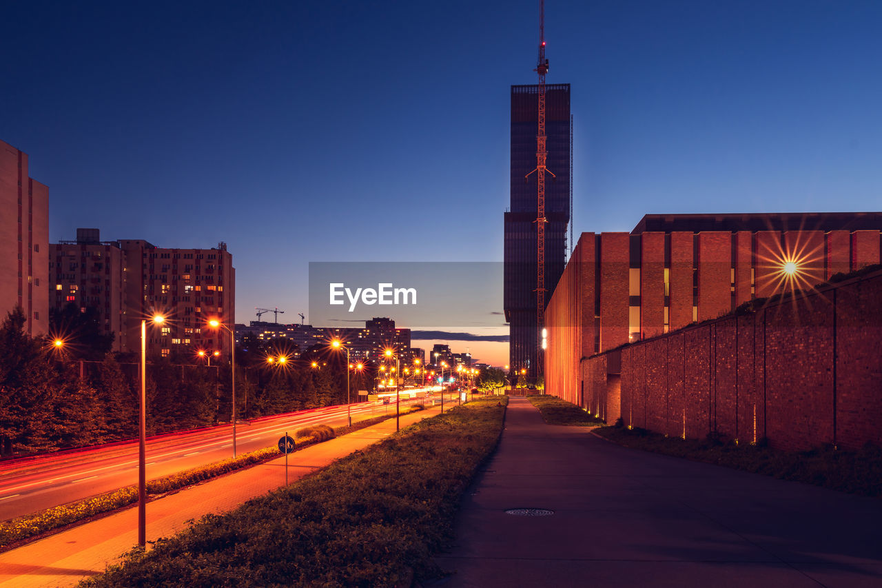 Night panorama of katowice, illuminated streets and cloudless sky