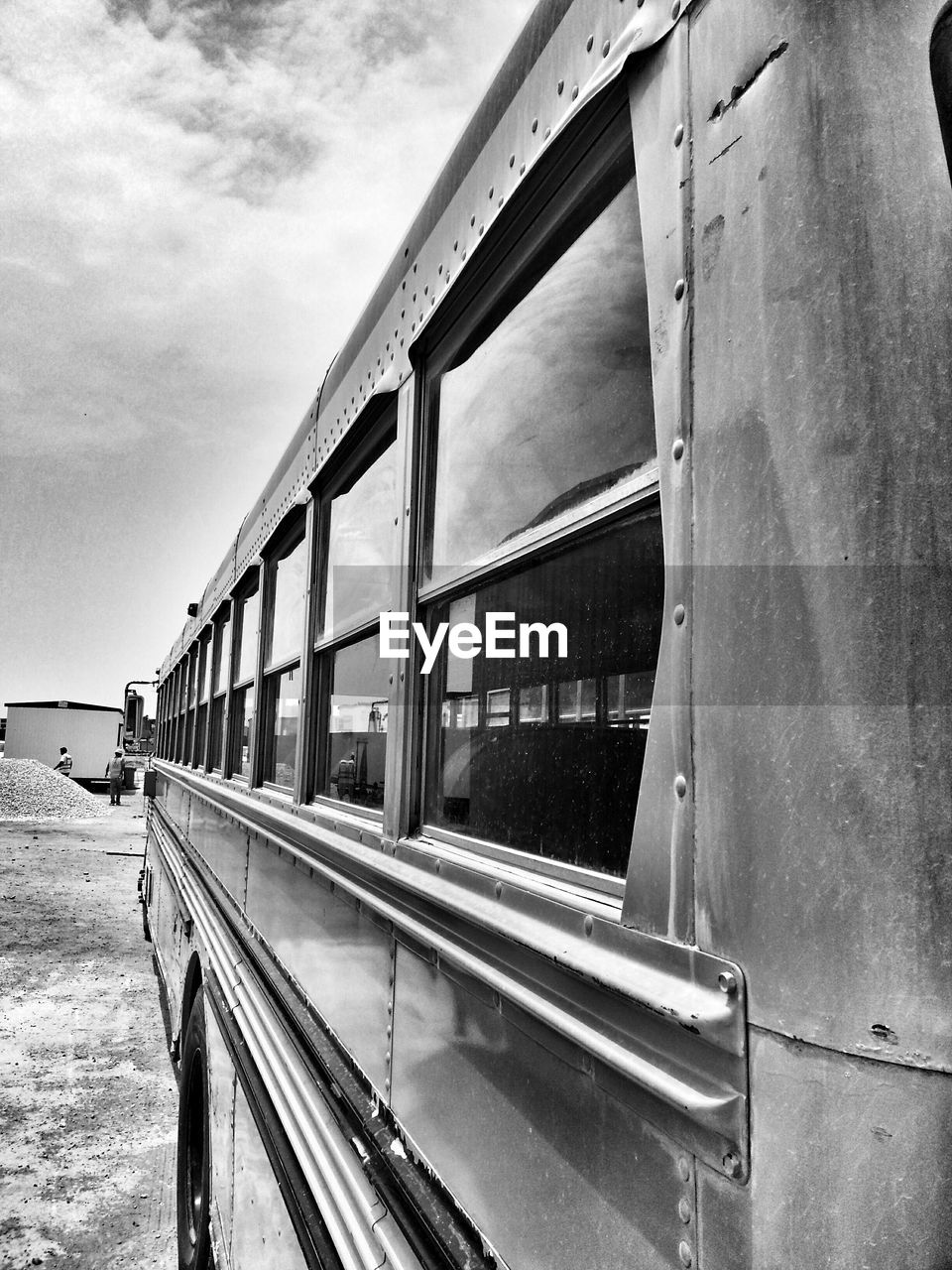 Train at railroad station against sky