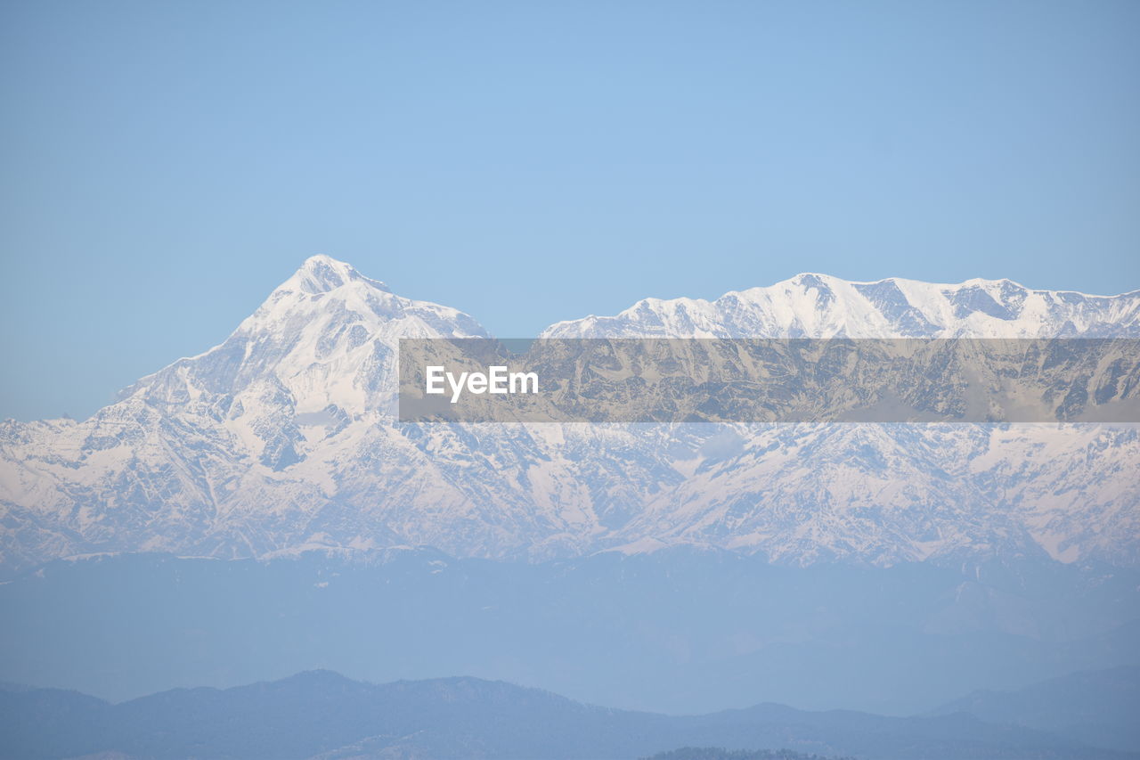 SNOWCAPPED MOUNTAIN AGAINST CLEAR SKY