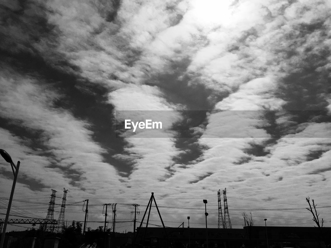 LOW ANGLE VIEW OF CLOUDY SKY AT SUNSET