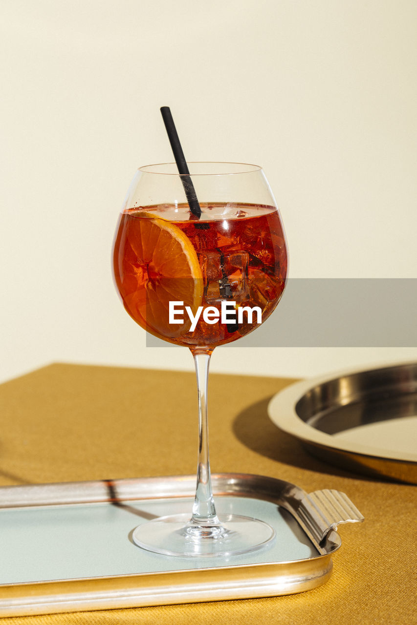 Close-up of drink in wineglass on table