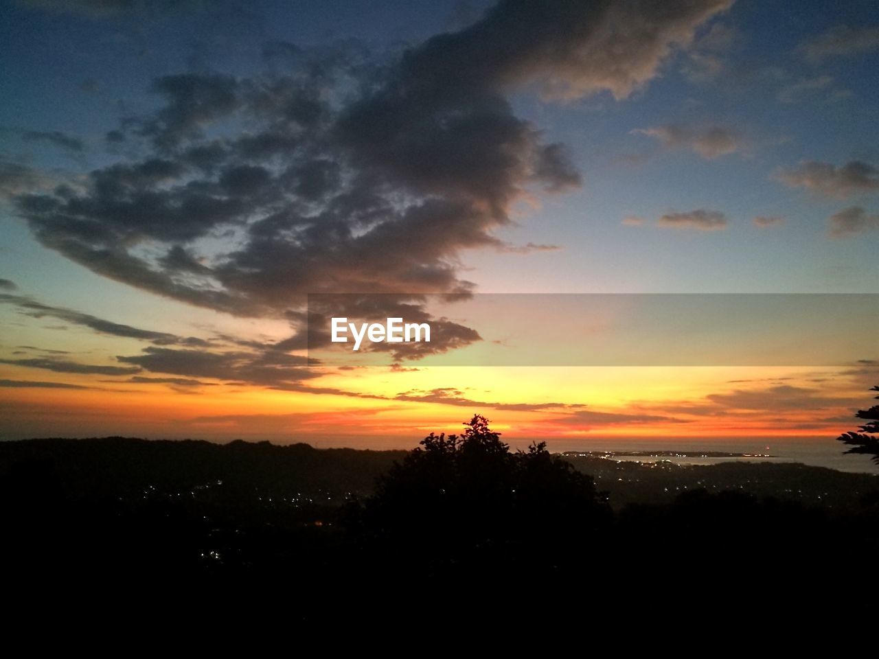 SILHOUETTE LANDSCAPE AGAINST SKY DURING SUNSET