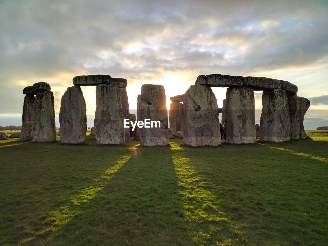 View of stonehenge at sunset