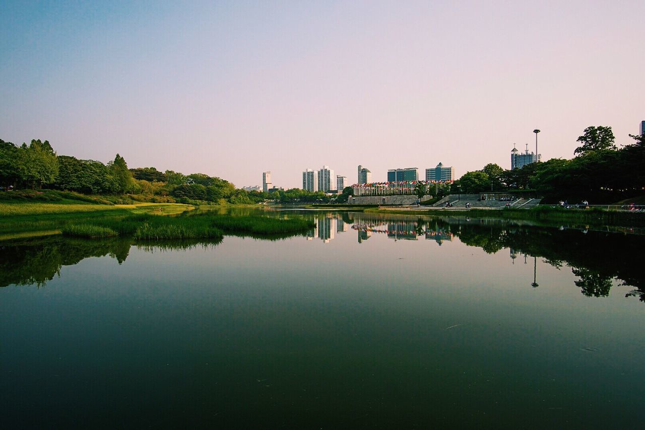 Reflection of city in river