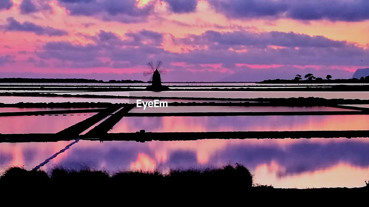 SCENIC VIEW OF SILHOUETTE AGAINST SKY DURING SUNSET