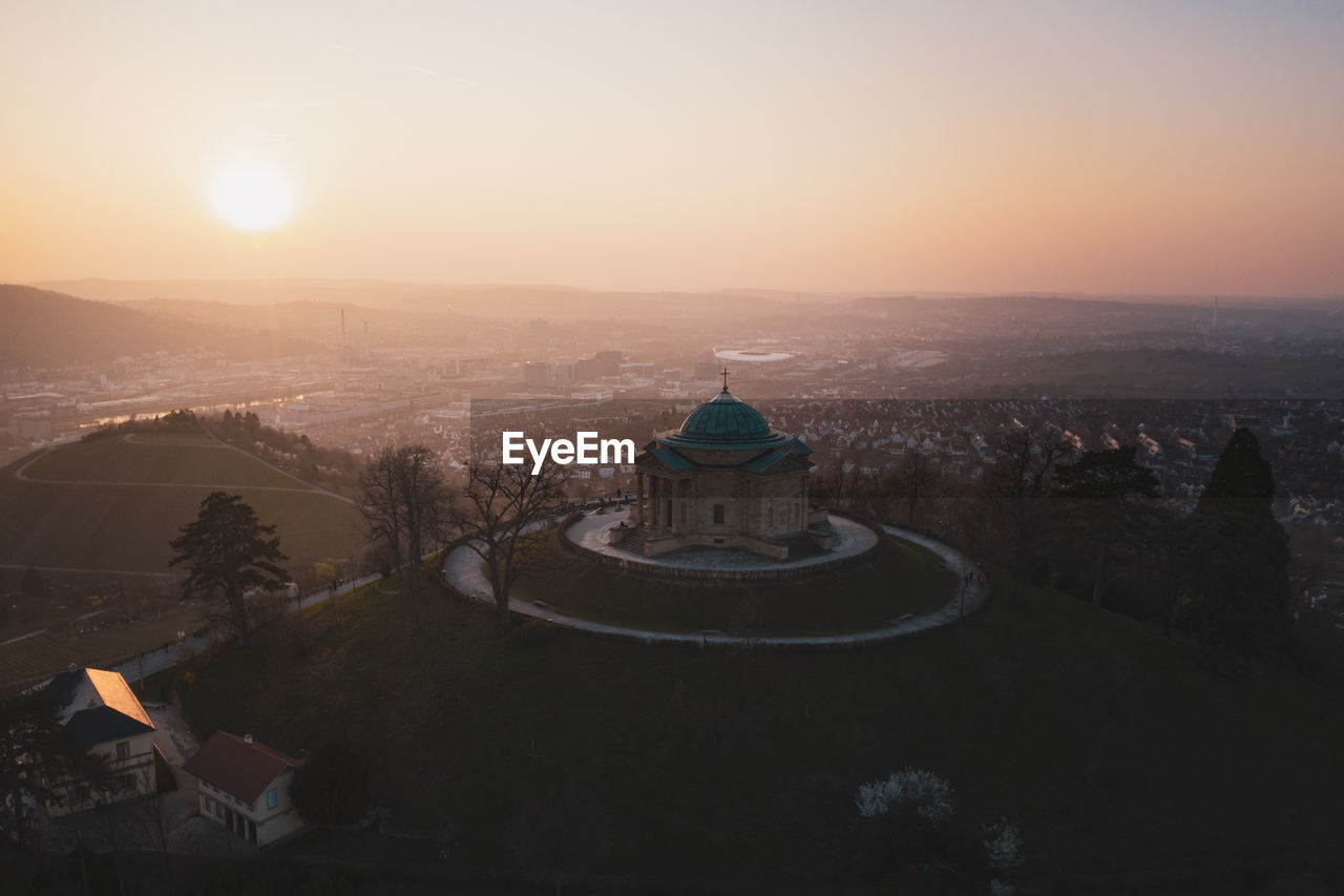 High angle view of cityscape against sky during sunset