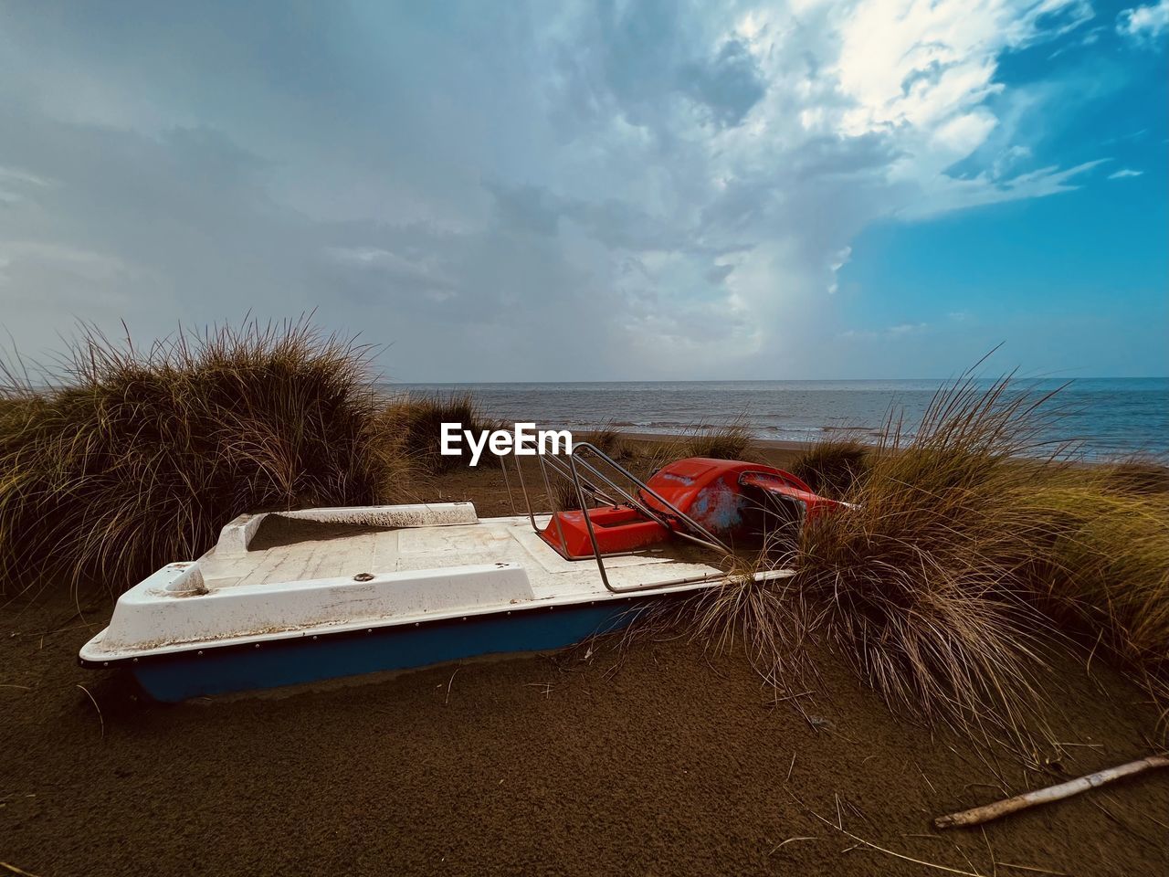 Boat in sea against sky