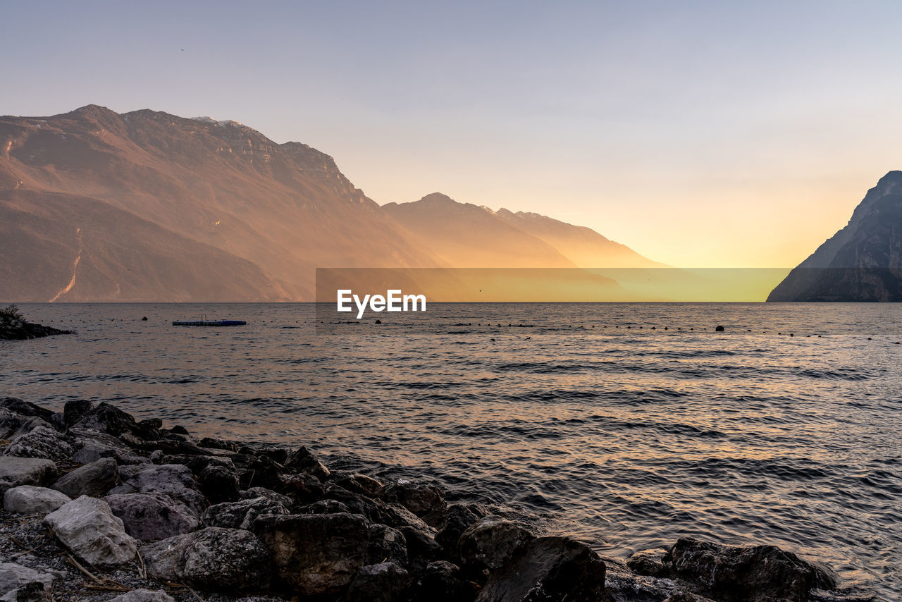 Scenic view of sea against sky during sunset