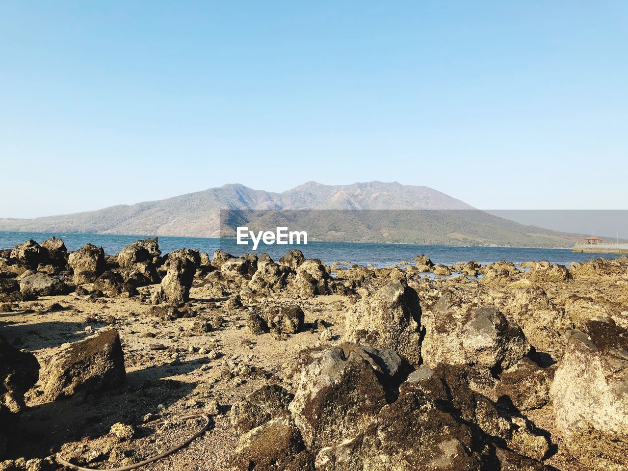 Scenic view of sea against clear sky