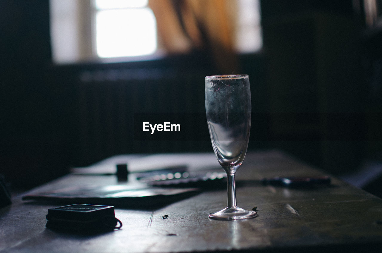 Close-up of wineglass on table