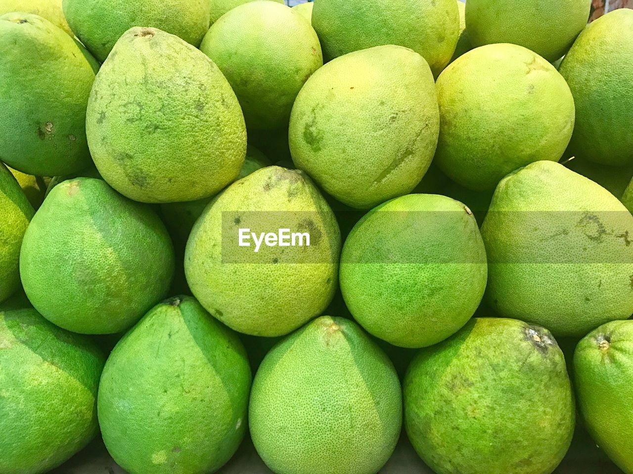 Full frame shot of green fruits at market